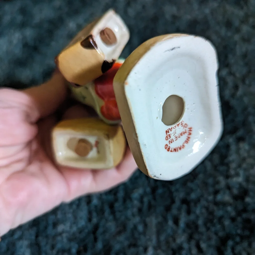 Vintage salt and pepper woman w luggage